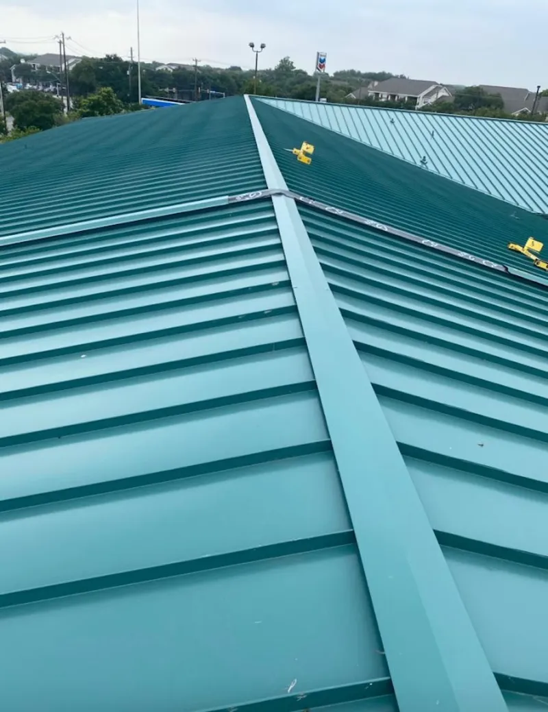 Green commercial metal roof ridge and valley for Metal Roof Repair in Corsicana